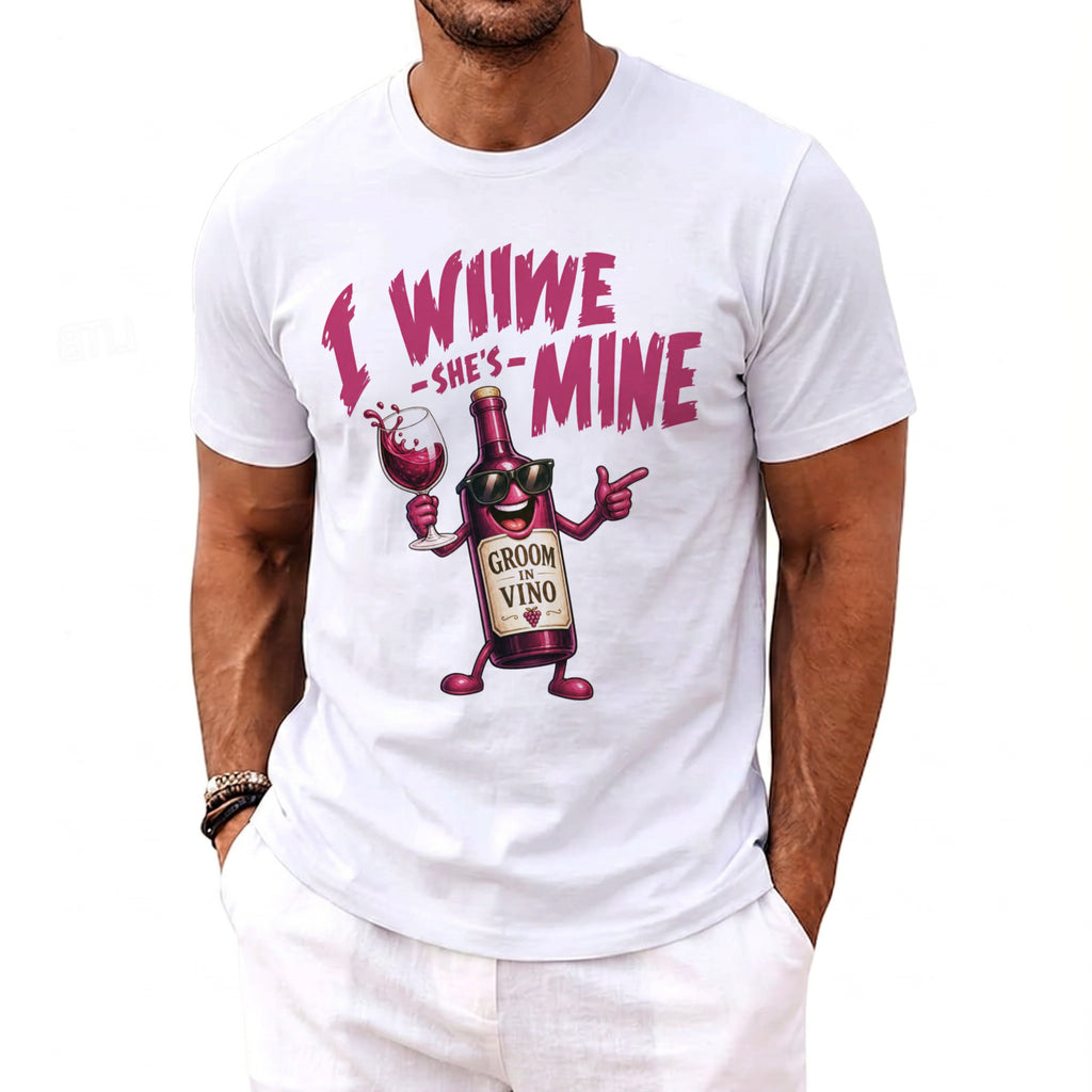White t-shirt with graphic of wine bottle saying "I Will She's Mine Groom in Vino".
