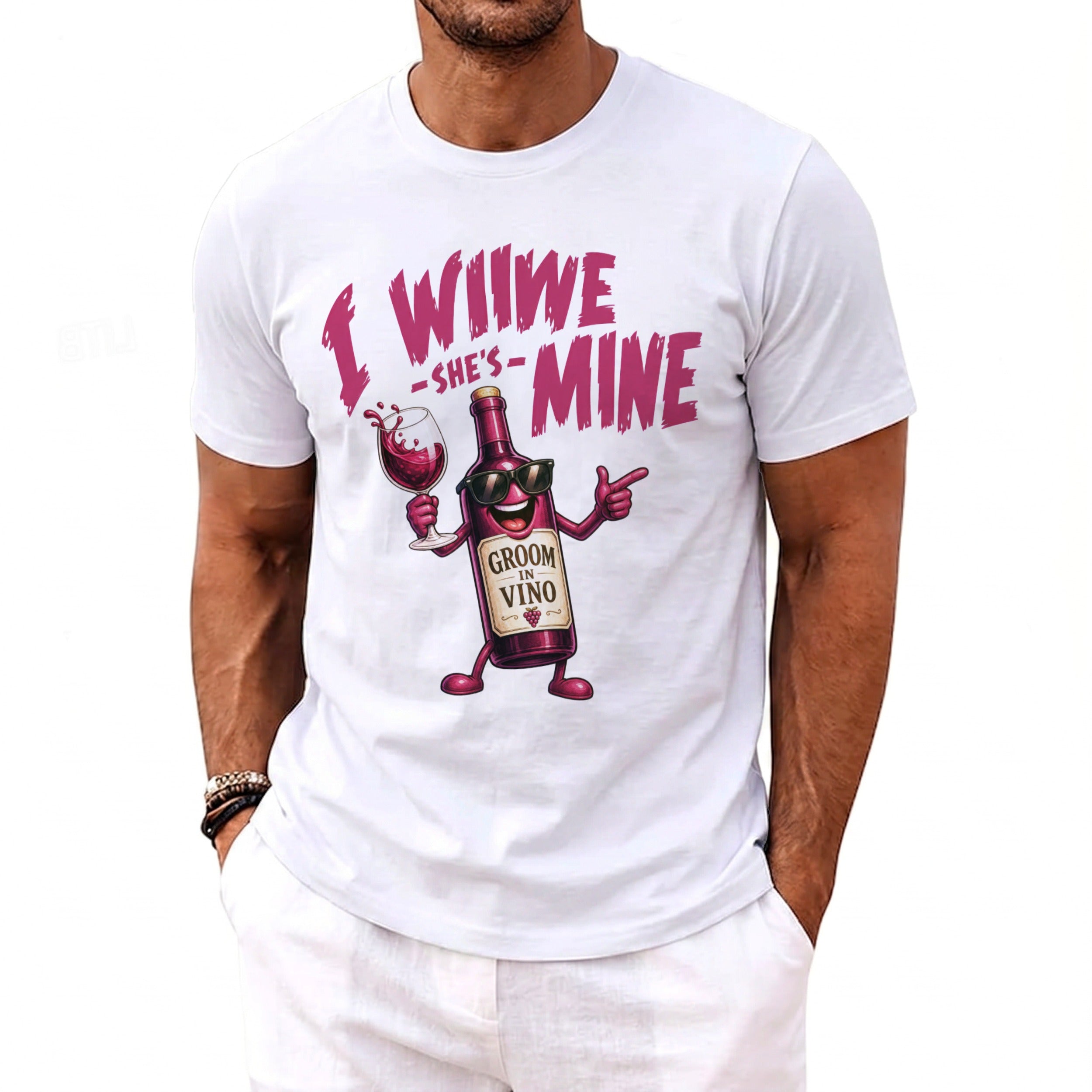 White t-shirt with graphic of wine bottle saying "I Will She's Mine Groom in Vino".