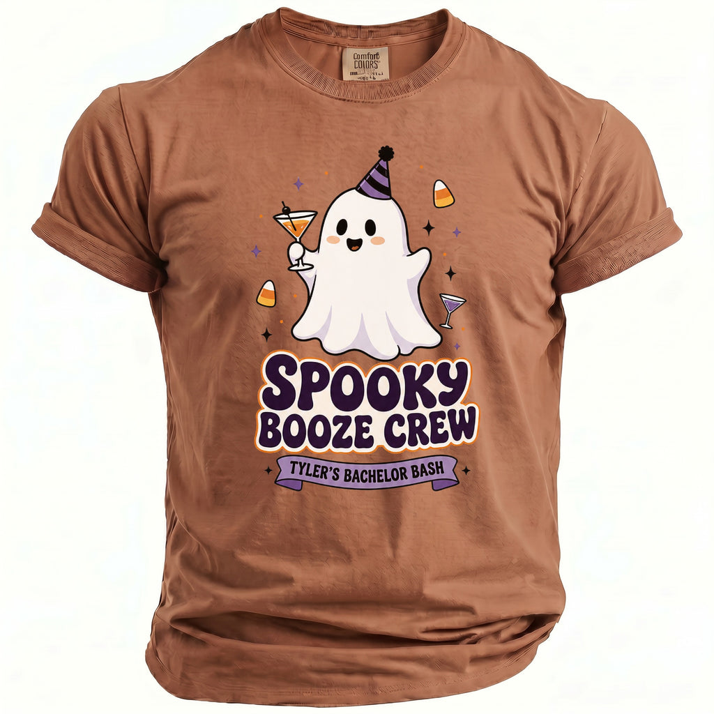 Brown t-shirt with a cartoon ghost, cocktails, and text "Spooky Booze Crew Tyler's Bachelor Bash".