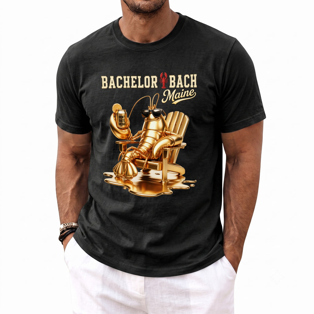 Black t-shirt with "Bachelor Bach Maine" text and a gold lobster in an Adirondack chair.