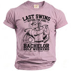 Pink t-shirt with a dragon golfer graphic and text "Last Swing Before the Ring" and "Bachelor Golf Weekend".