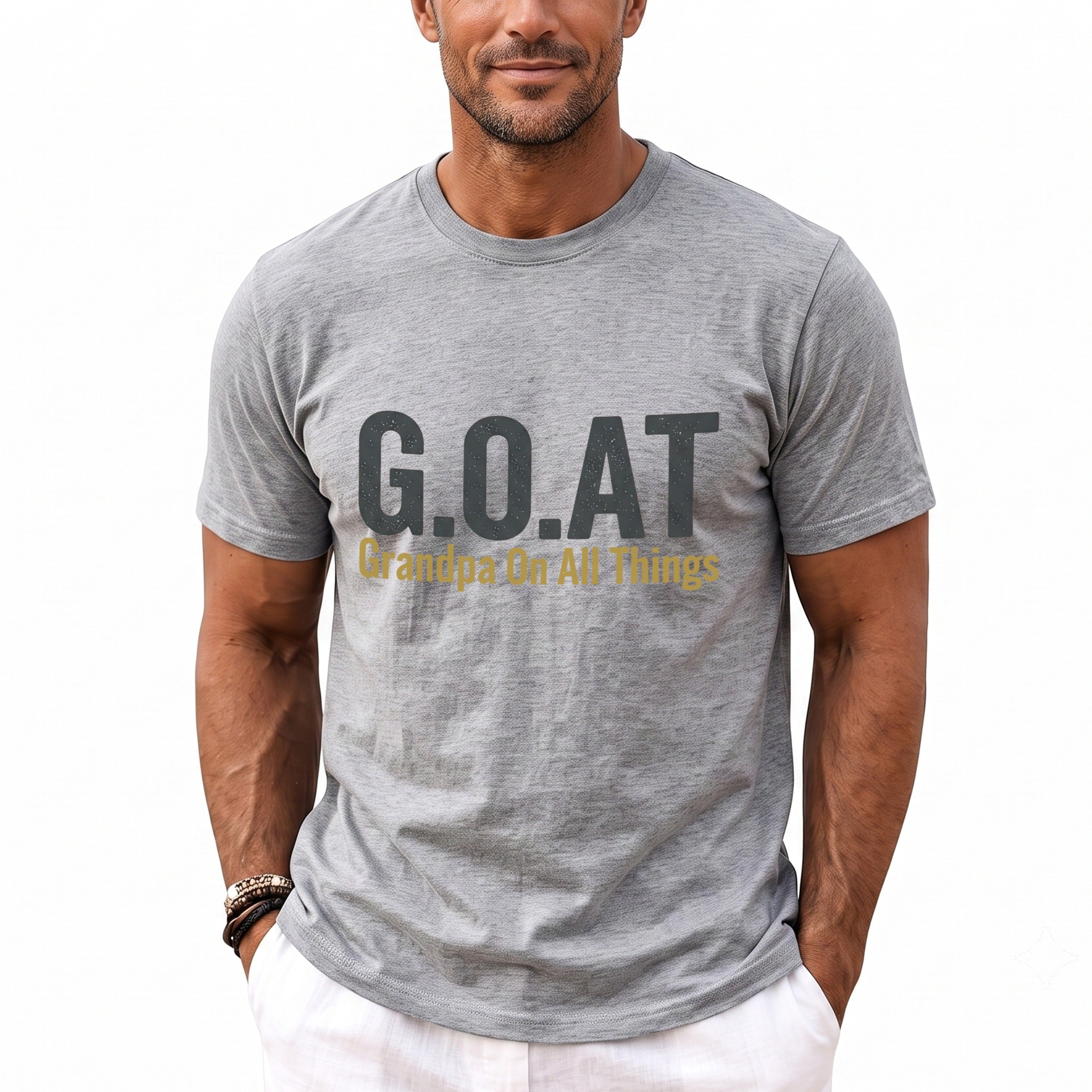 Grey t-shirt with "G.O.A.T. Grandpa On All Things" text on chest.