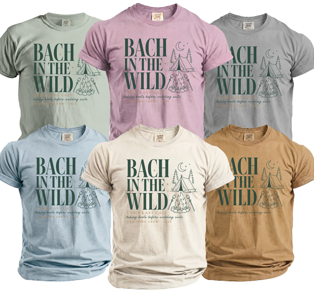 T-shirts with "Bach in the Wild" text and camping graphics in various colors.