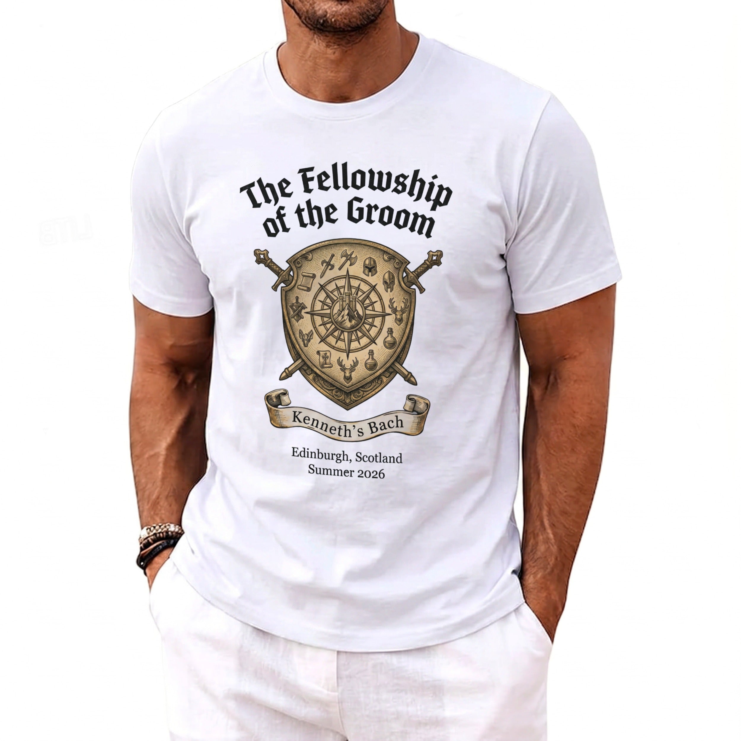 White t-shirt with "The Fellowship of the Groom" crest for Kenneth's Bach in Edinburgh.