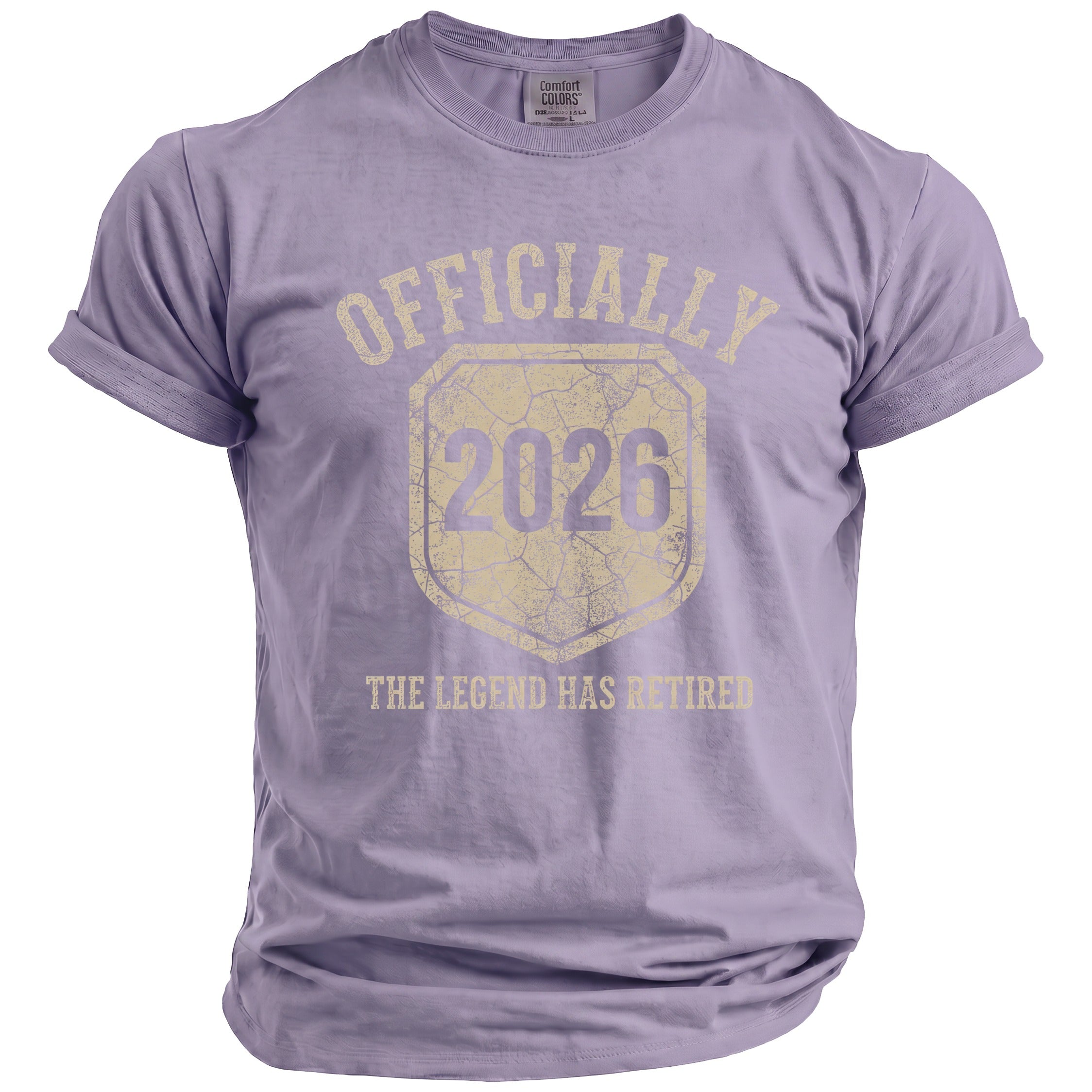 Lavender t-shirt with distressed text "OFFICIALLY 2026 THE LEGEND HAS RETIRED".