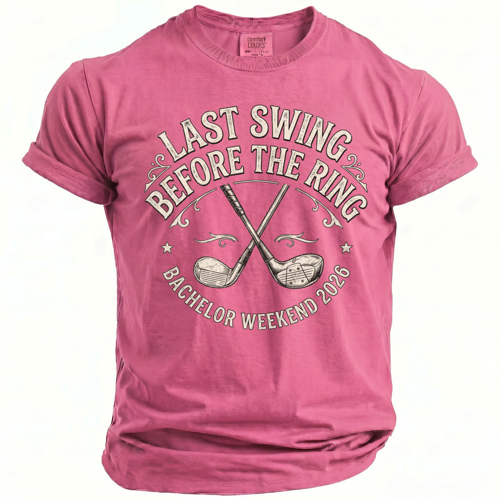 Pink t-shirt with graphic of crossed golf clubs and "Last Swing Before the Ring Bachelor Weekend 2026".