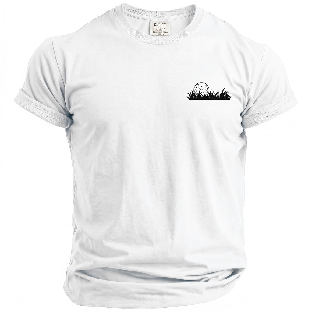 White Comfort Colors t-shirt with a black golf ball and grass design.