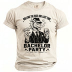 Dragon in suit at bachelor party holding cards and whiskey, text reads "Rolling the Dice One Last Time".