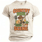 Cream t-shirt with "Country Bach Scene," guitar, cowboy hat, and beer.
