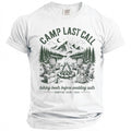 White t-shirt with "Camp Last Call" graphic depicting a campfire scene.