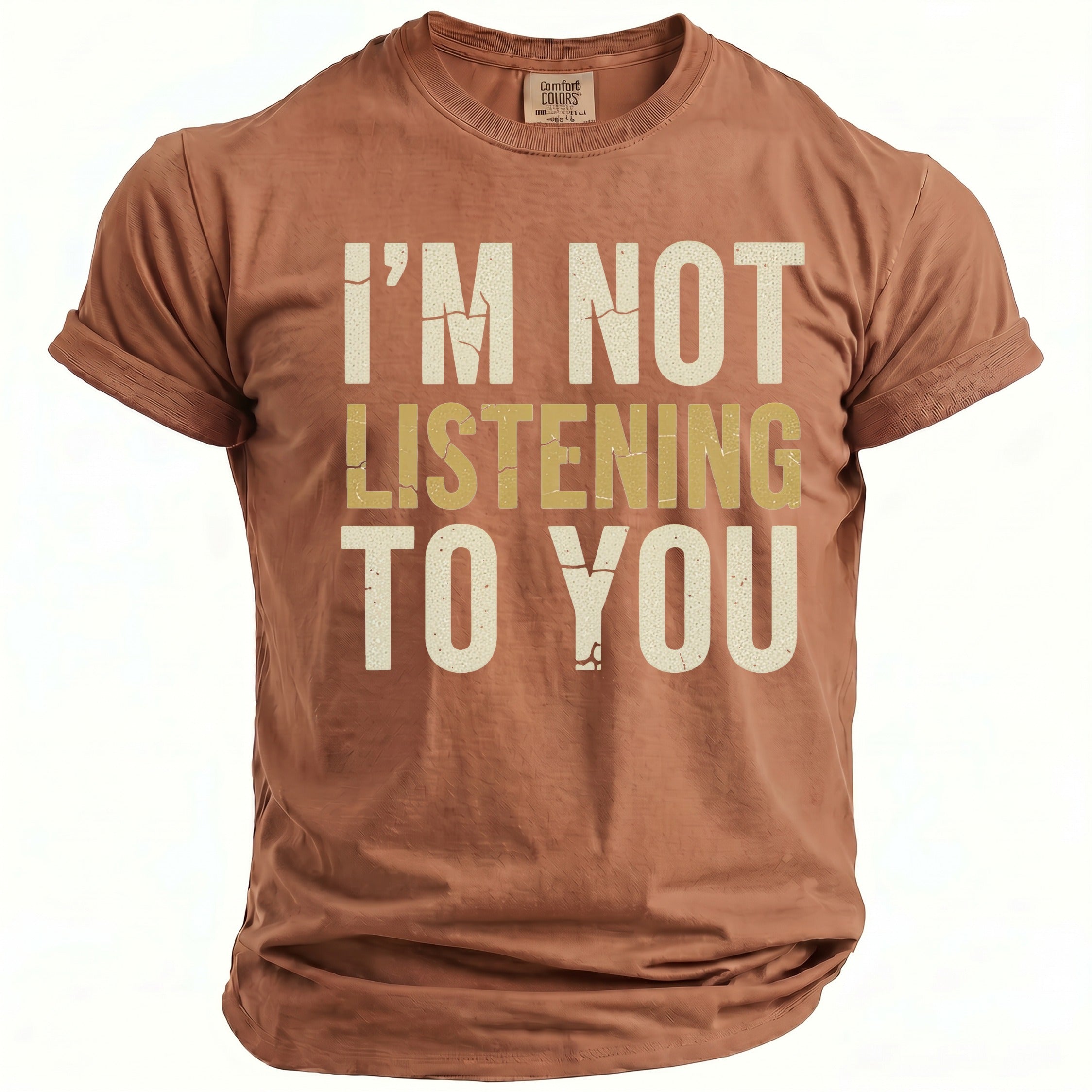 Brown t-shirt with distressed text reading "I'M NOT LISTENING TO YOU".