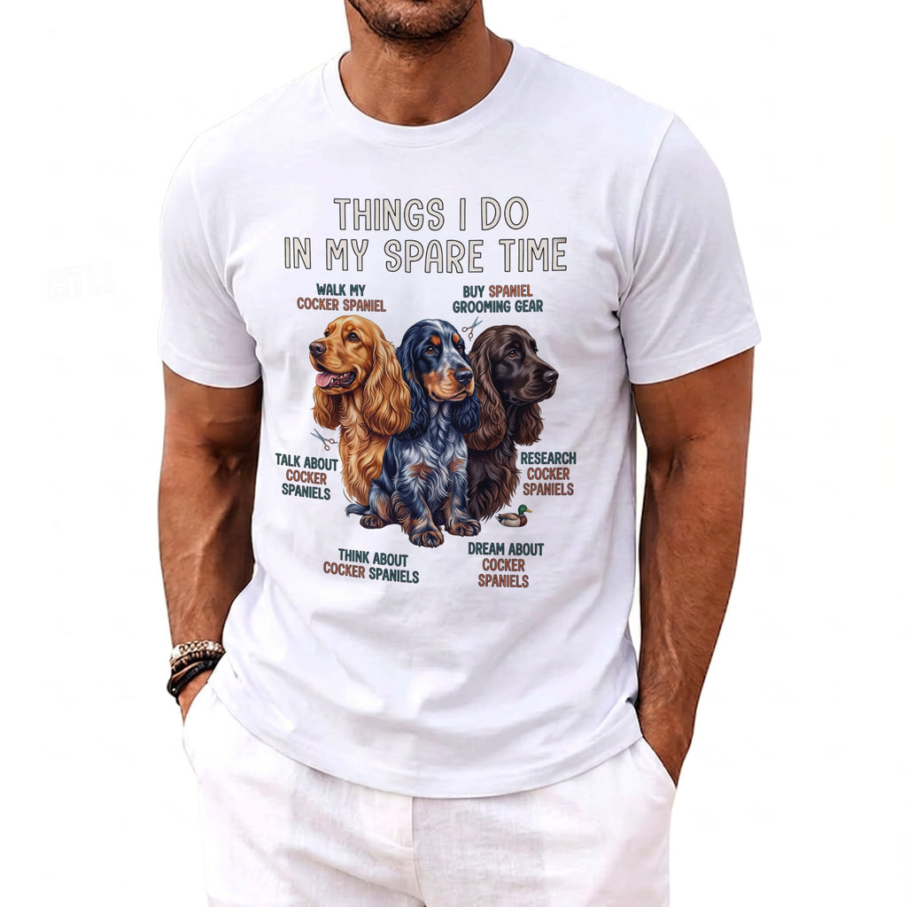 White t-shirt featuring three cocker spaniels and text about spare time activities.