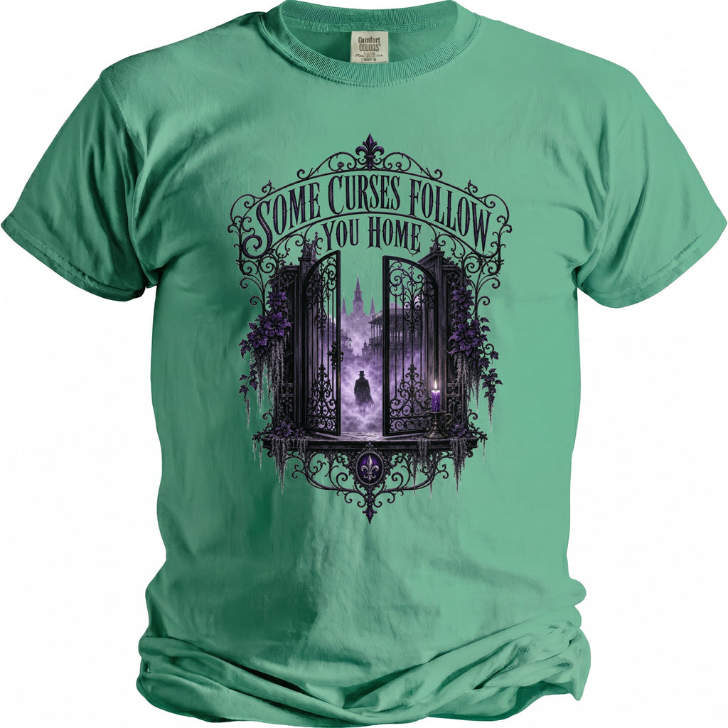 Green t-shirt with "Some Curses Follow You Home" and open gate design.