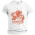White t-shirt with an orange lobster graphic holding a coffee mug that says "But First, Lobster."