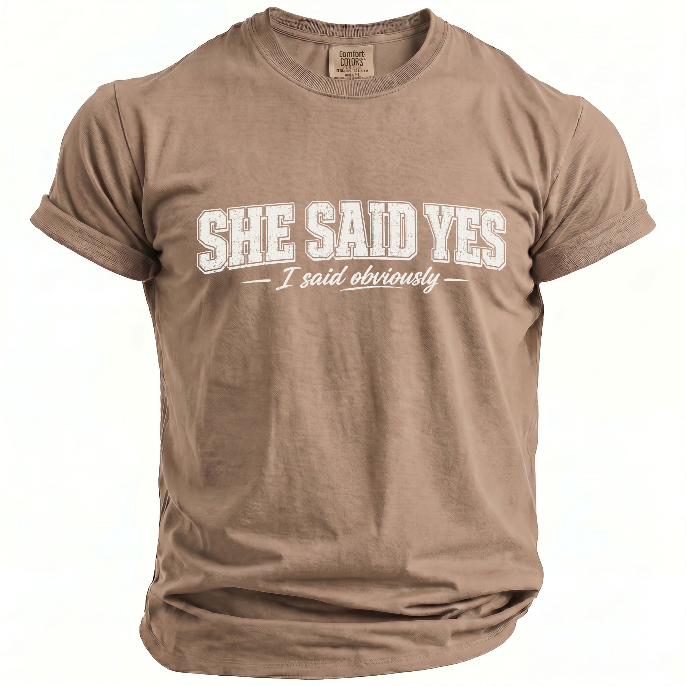 Brown t-shirt with "SHE SAID YES - I said obviously" text.