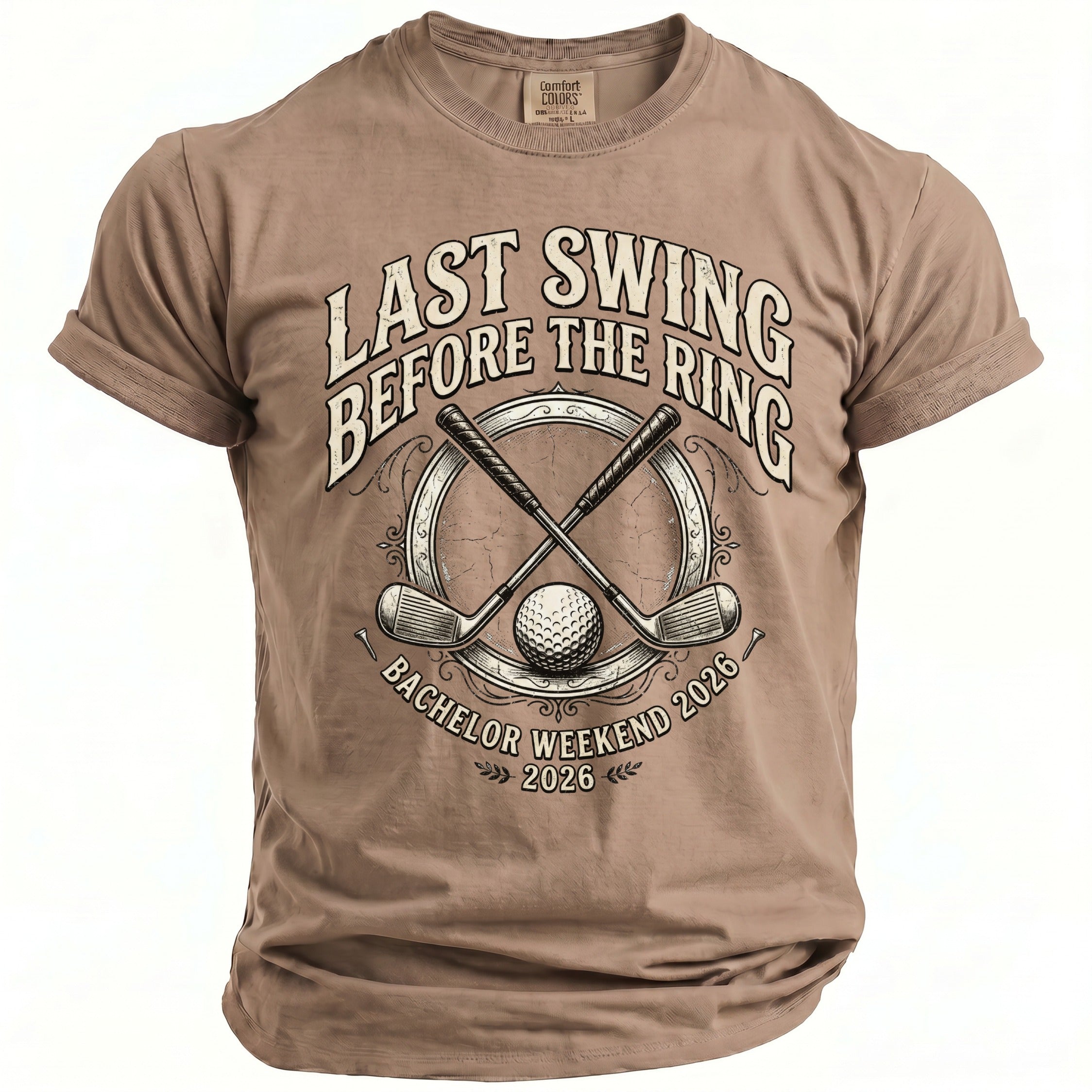 Taupe t-shirt with "Last Swing Before the Ring Bachelor Weekend 2026" text and golf graphics.