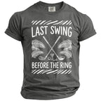 Gray t-shirt with "Last Swing Before The Ring" text and golf graphics.