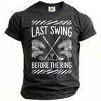 Black t-shirt with "LAST SWING BEFORE THE RING" golf graphic.