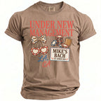 T-shirt with "Under New Management" text, casino chips, bow, and cherries.