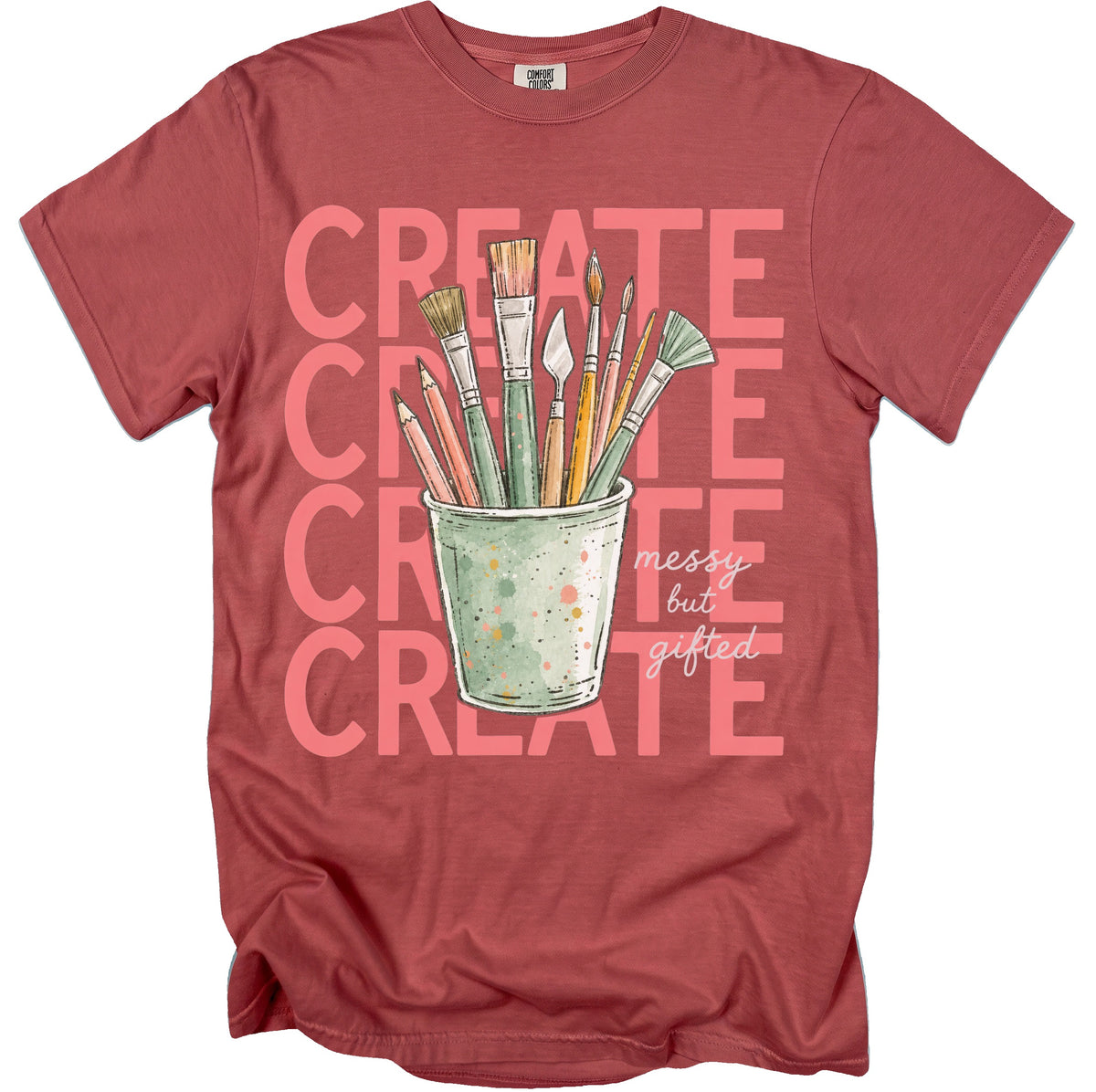 Red t-shirt with "CREATE" text and a cup of art supplies.