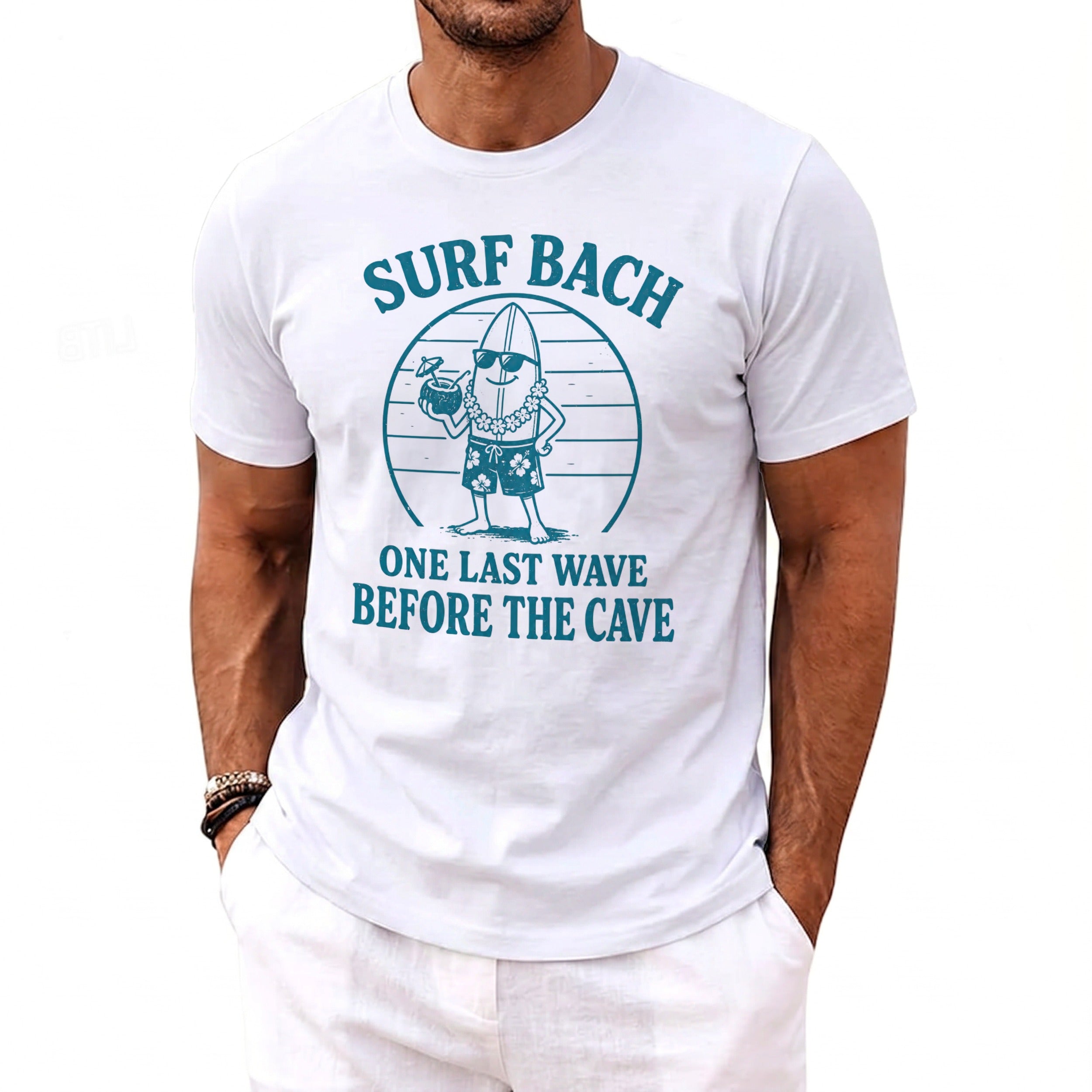 White t-shirt with "SURF BACH ONE LAST WAVE BEFORE THE CAVE" text and surfing graphic.