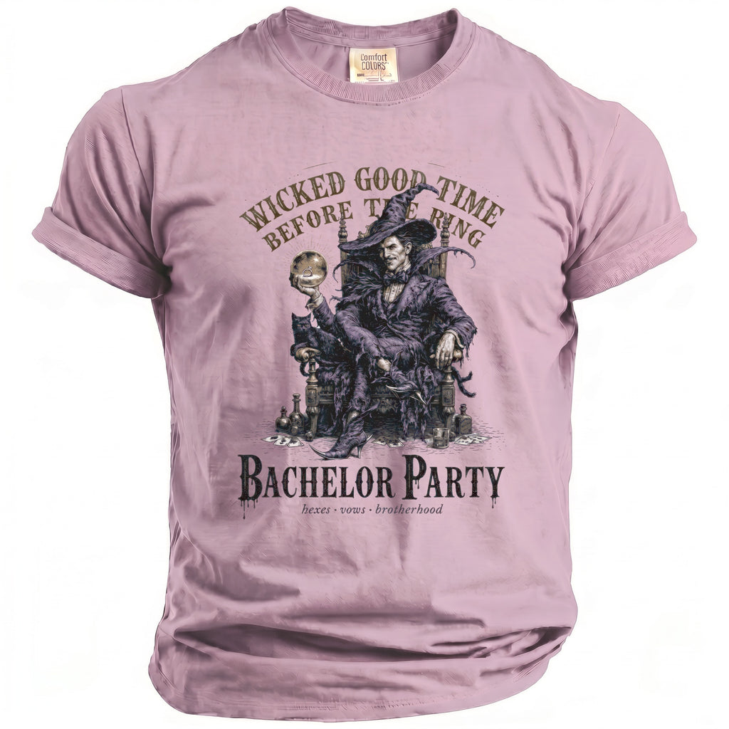 Pink t-shirt with a witch holding a ring and text "Wicked Good Time Before The Ring Bachelor Party".
