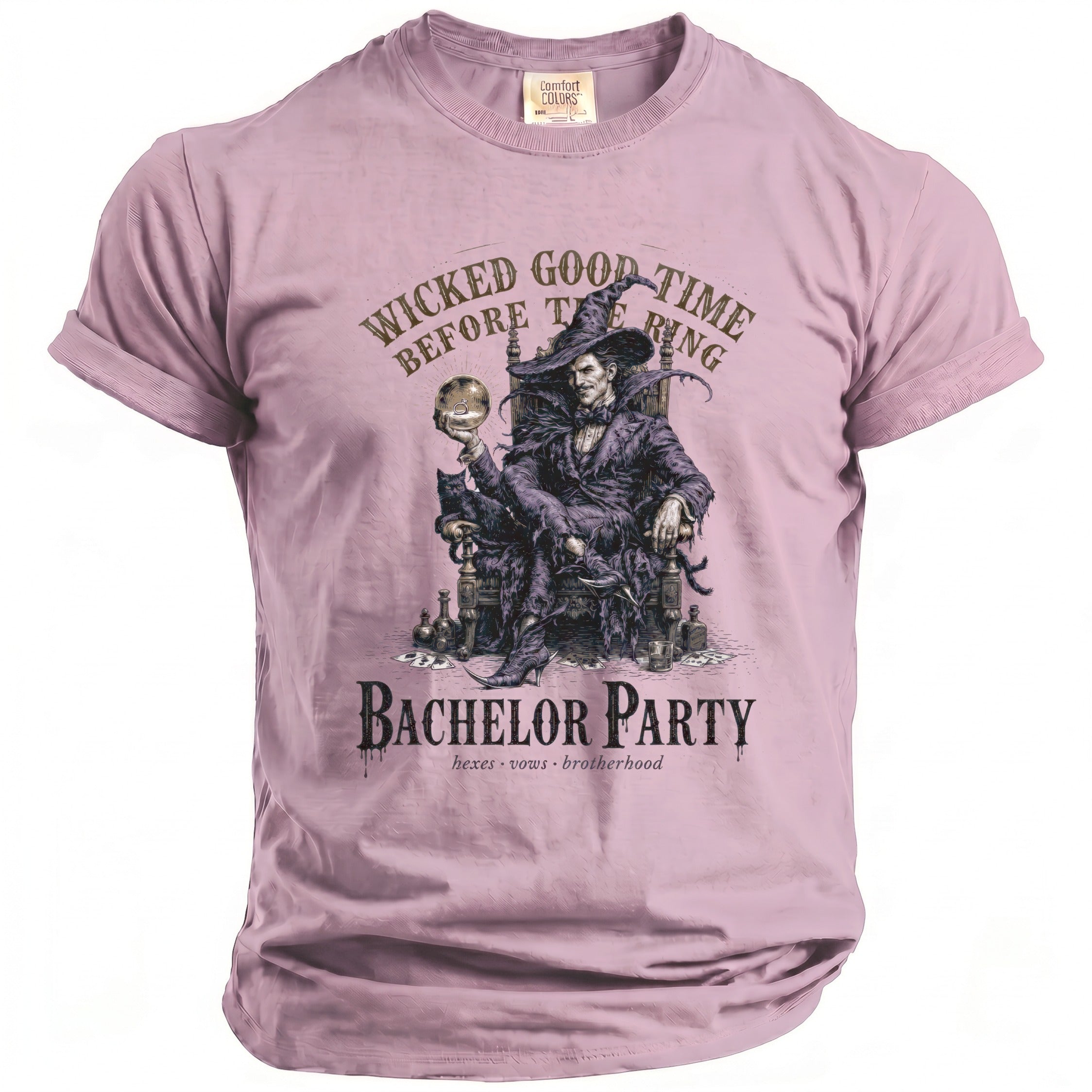 Pink t-shirt with a witch holding a ring and text "Wicked Good Time Before The Ring Bachelor Party".