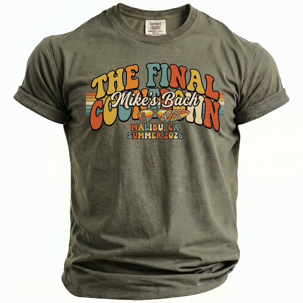 Olive green t-shirt with retro graphic "The Final Mike's Bach" and "Malibu, CA Summer 2026"