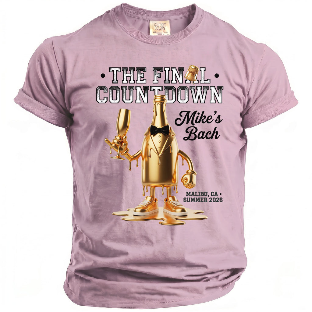 Pink t-shirt with gold bottle, champagne glass, and "The Final Countdown Mike's Bach" text.