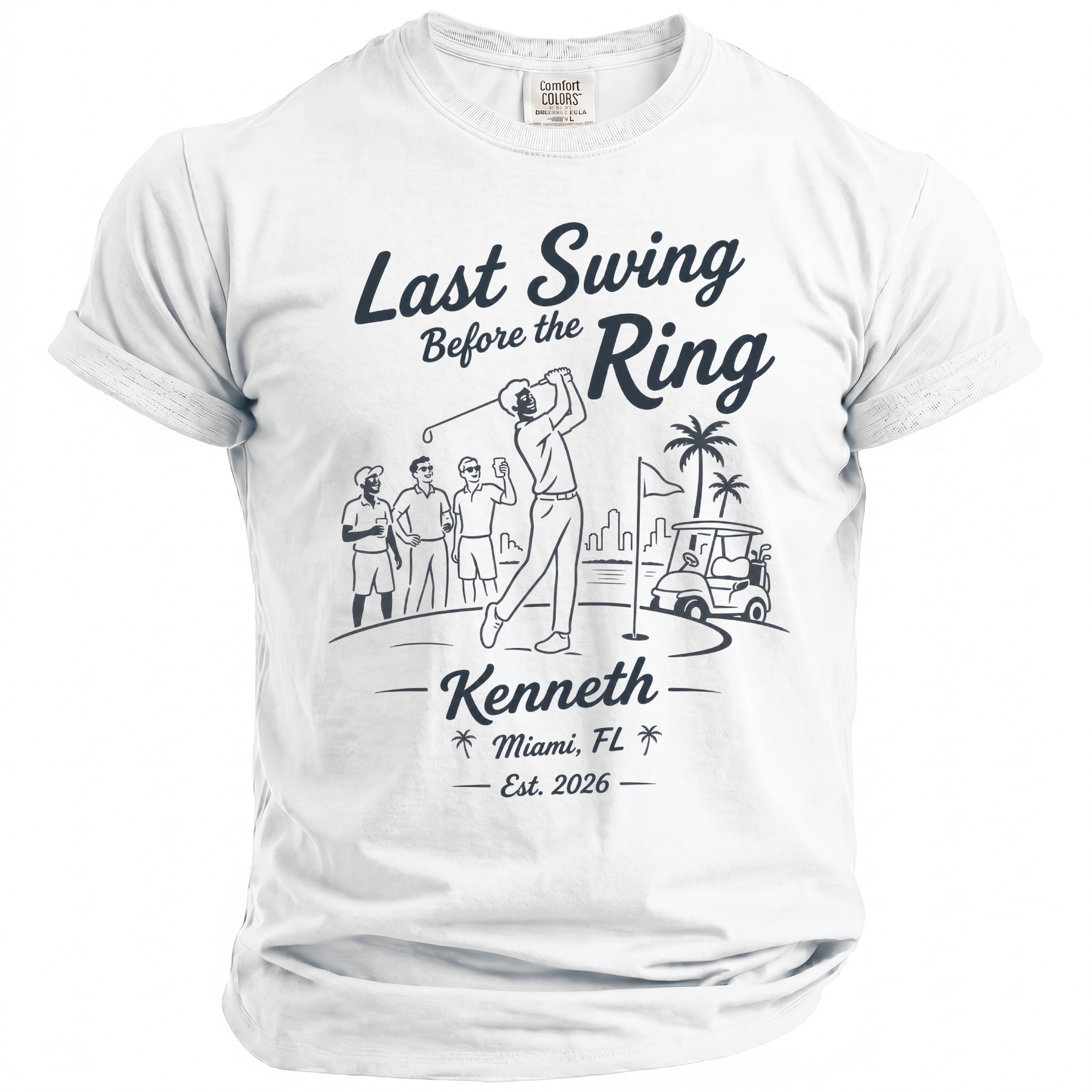 White t-shirt with "Last Swing Before the Ring" golf graphic, Kenneth, Miami, FL, Est. 2026.