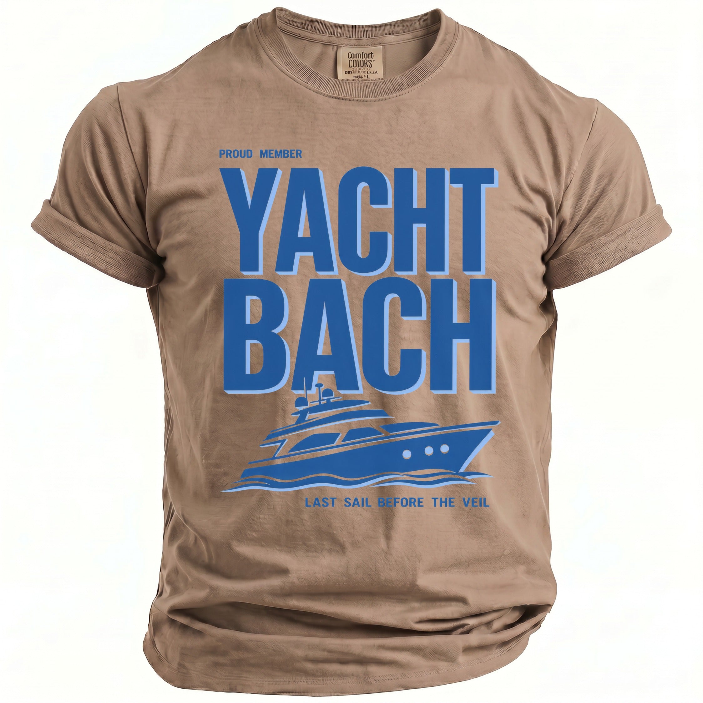 Taupe t-shirt with blue text "Yacht Bach" and a yacht graphic.