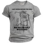 Grey t-shirt with a cartoon dragon golfing, saying "Last Swing Before the Ring" and "Bachelor Golf Weekend".