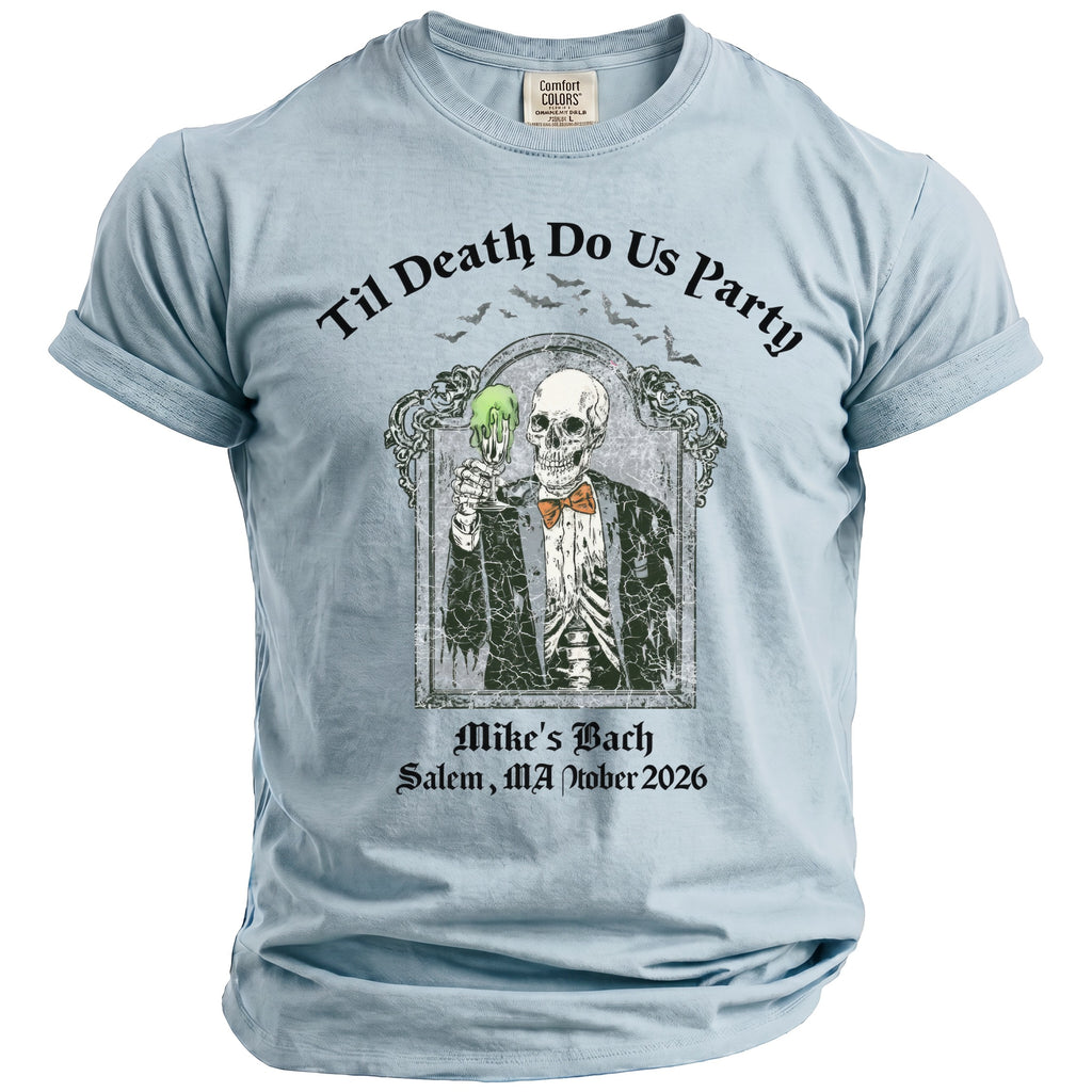 Light blue t-shirt with skeleton holding green drink, "Til Death Do Us Party" and event details.
