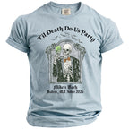 Light blue t-shirt with skeleton holding green drink, "Til Death Do Us Party" and event details.