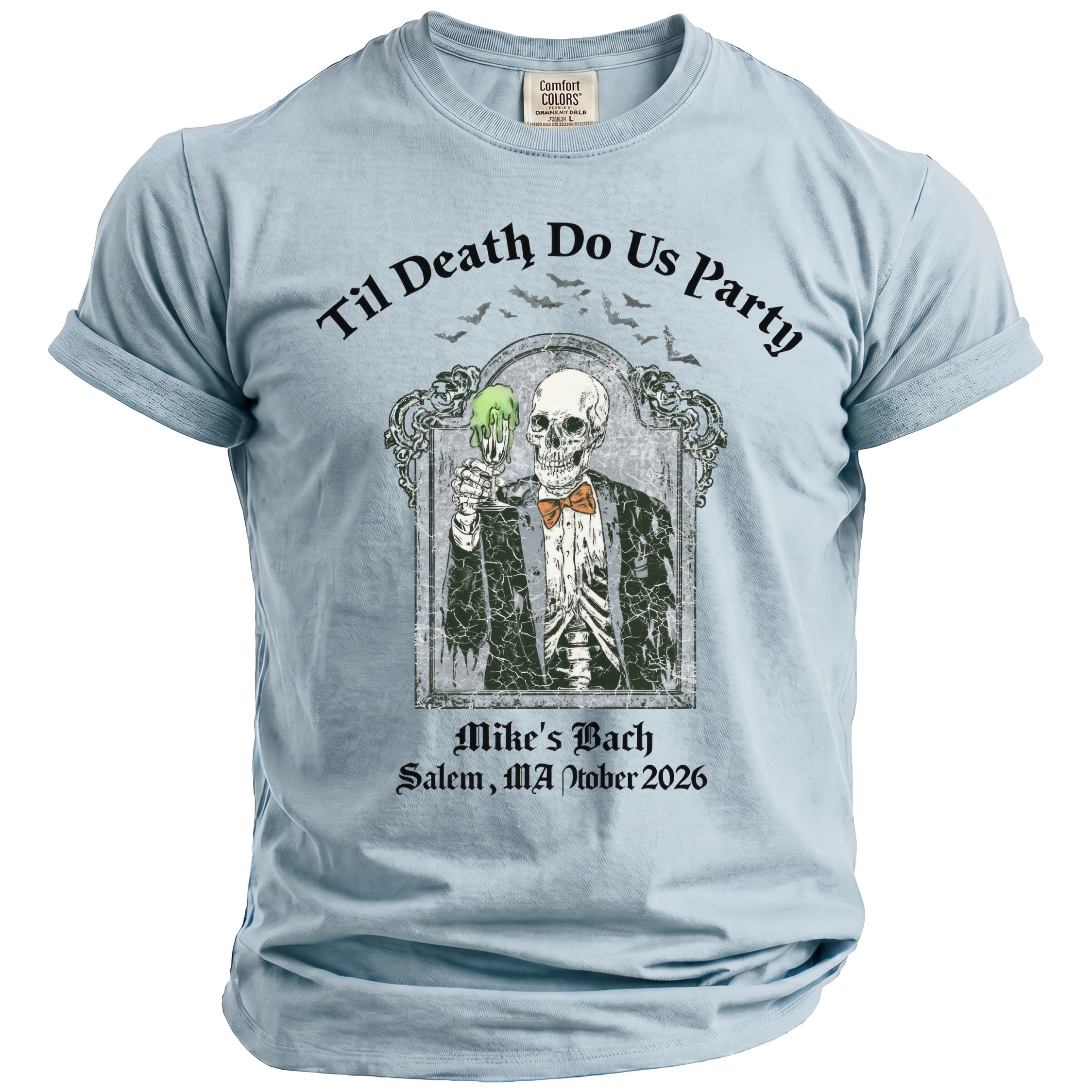 Light blue t-shirt with skeleton holding green drink, "Til Death Do Us Party" and event details.