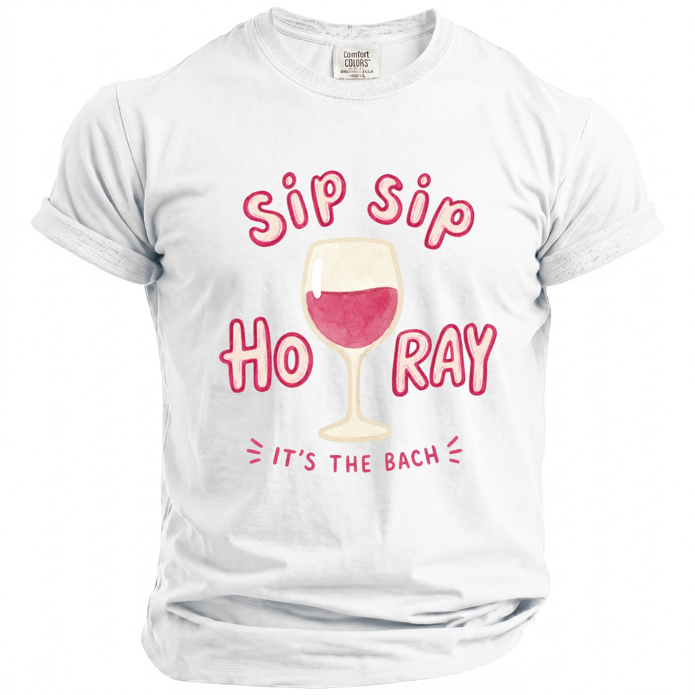 White t-shirt with "Sip Sip Ho Ray It's The Bach" text and wine glass graphic.