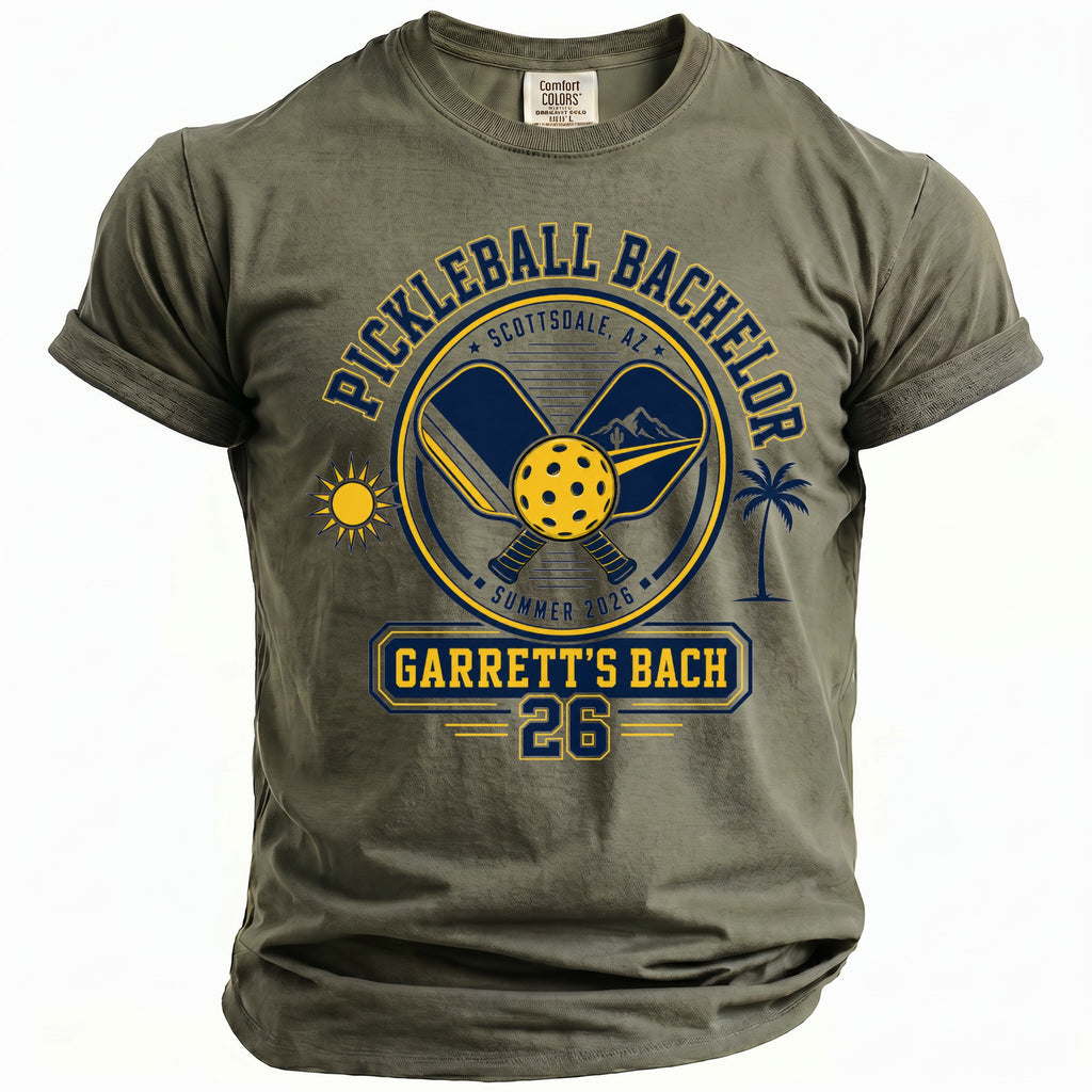 Olive green t-shirt with "Pickleball Bachelor Scottsdale, AZ Summer 2026 Garrett's Bach 26" graphic.
