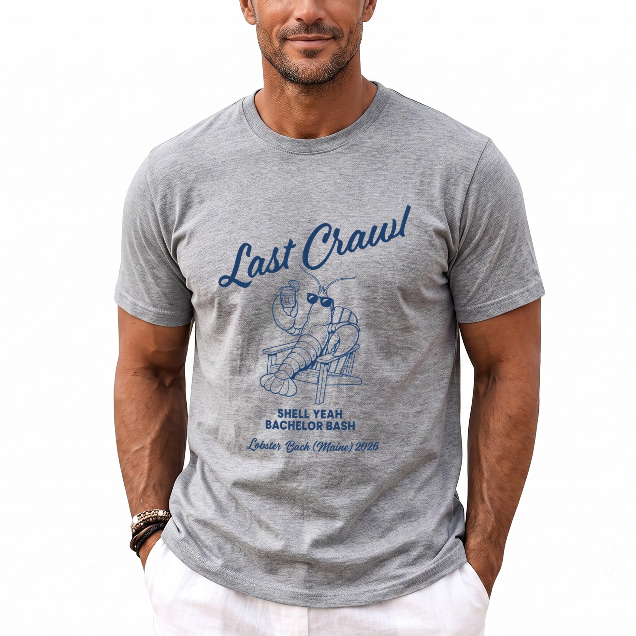 Grey t-shirt with blue graphic: "Last Crawl", lobster in chair, "SHELL YEAH BACHELOR BASH", "Lobster Bach (Maine) 2026".