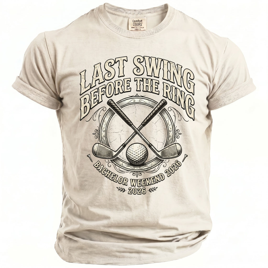 Light grey t-shirt with "Last Swing Before The Ring" and "Bachelor Weekend 2026" golf graphic.
