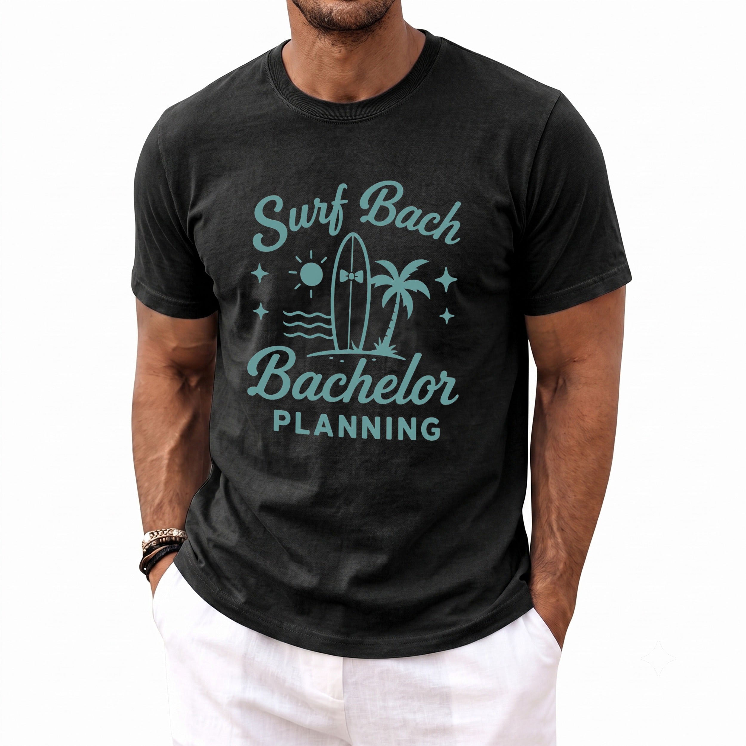 Black t-shirt with "Surf Bach Bachelor Planning" text and beach graphic.