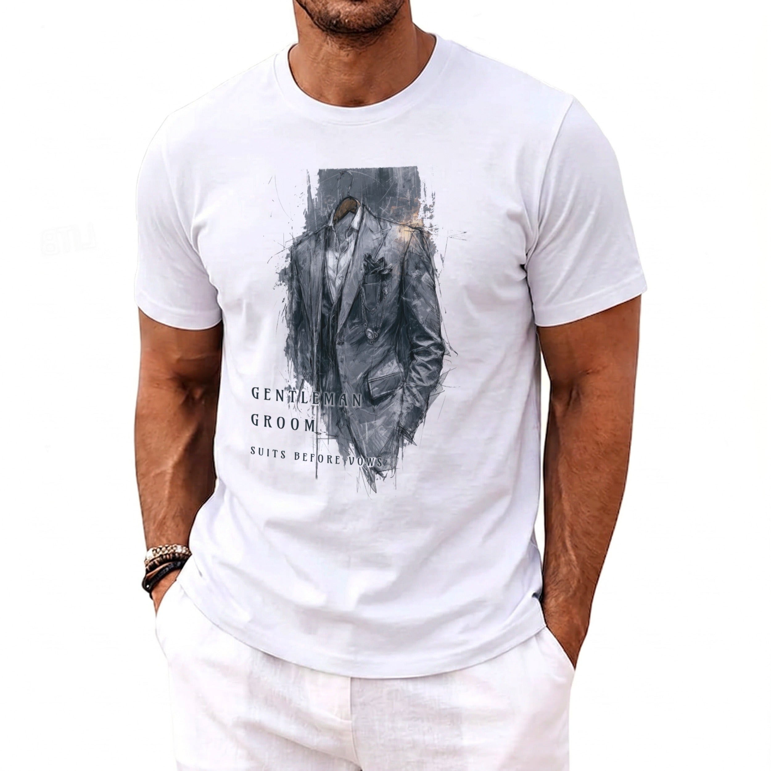 White t-shirt featuring a black and gray sketch of a suit with text "GENTLEMAN GROOM SUITS BEFORE VOWS".