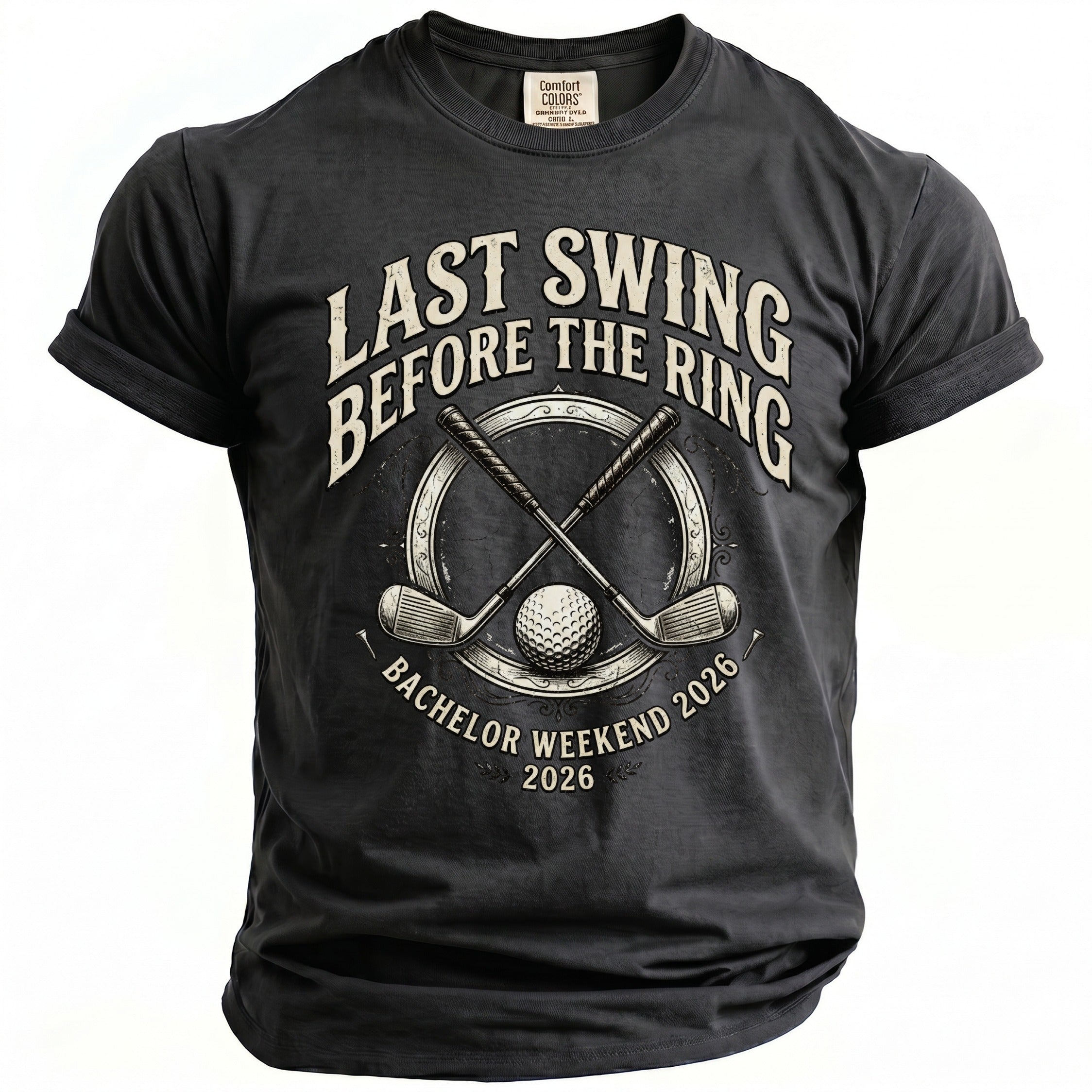 Dark grey t-shirt with golf clubs, ball, and text "Last Swing Before the Ring Bachelor Weekend 2026".