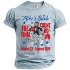 Light blue t-shirt with "Mike's Bach The Final Count-Down for Malibu 2026" text.