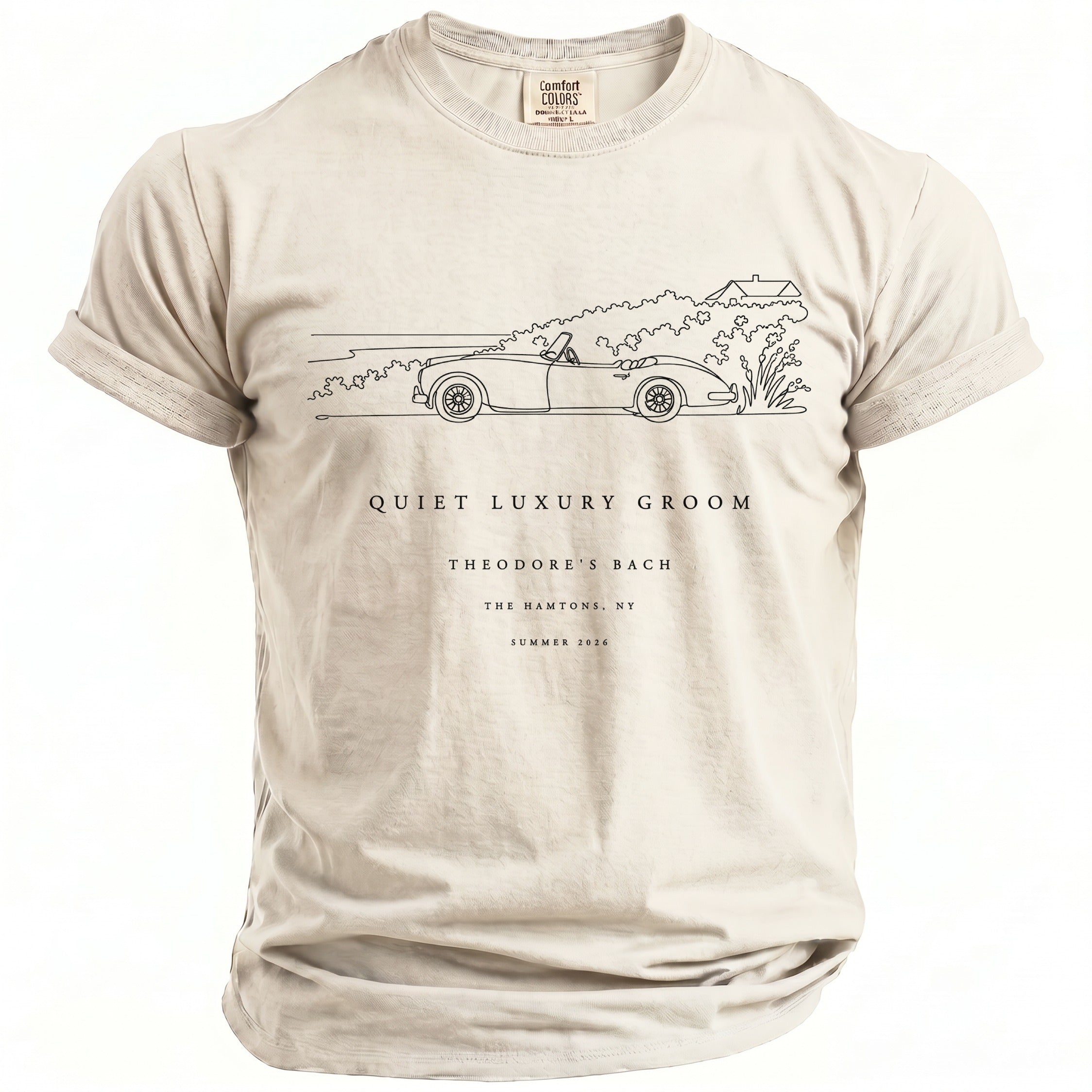 Light tan t-shirt with black line art of a convertible and "Quiet Luxury Groom Theodore's Bach The Hamptons, NY Summer 2026".