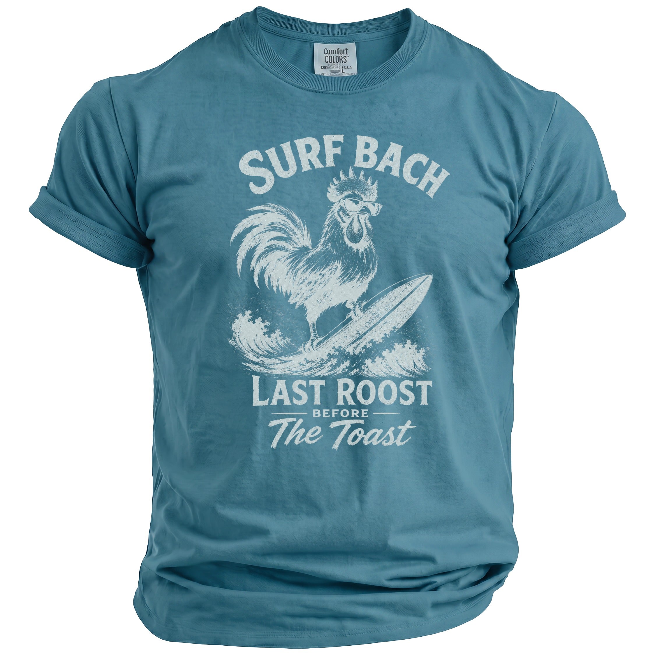 Teal t-shirt with "Surf Bach Last Roost Before The Toast" text and rooster on surfboard graphic.