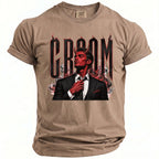 Tan t-shirt with gothic graphics of a devil and flames, spelling the word "GROOM".