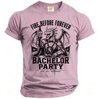 Pink shirt with a dragon graphic wearing armor and holding a beer, text reads "Fire Before Forever Bachelor Party".