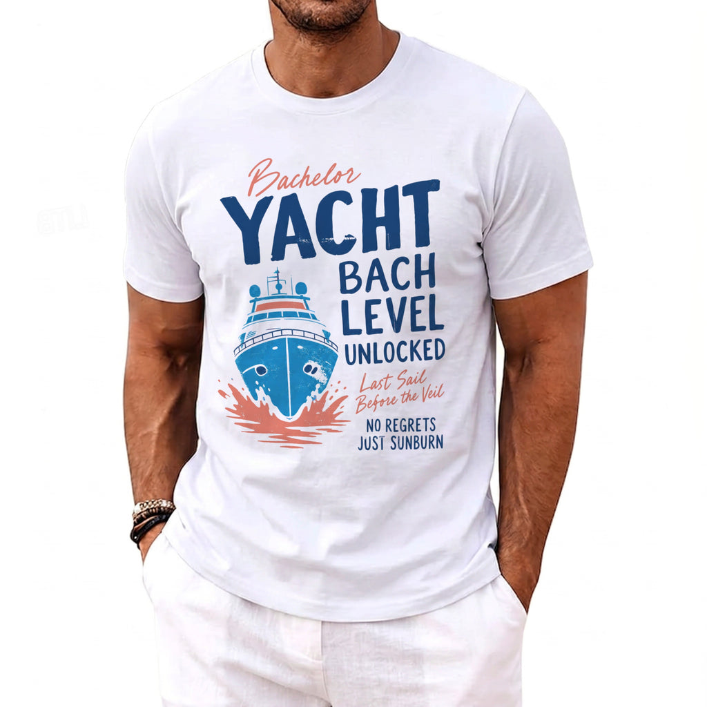 White t-shirt with "Bachelor Yacht Bach Level Unlocked" and a yacht graphic.