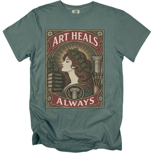 T-shirt with a vintage illustration of a woman, books, and art supplies, saying "Art Heals Always."