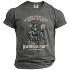 T-shirt with graphic of a witch-like figure holding a ring and text "Wicked Good Time Before the Ring" and "Bachelor Party".